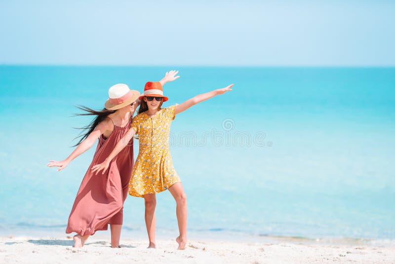 Beautiful Mother and Daughter on the Beach Stock Image - Image of ...