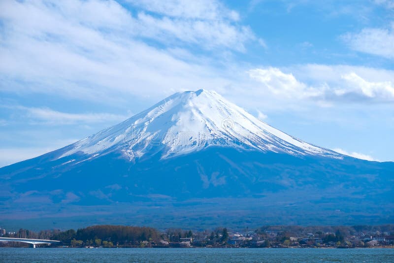 Beautiful Mount Fuji with snow capped and sky at Lake kawaguchiko, Japan. landmark and popular for tourist attractions royalty free stock image