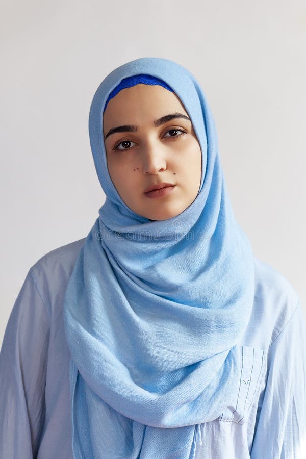 Beautiful Muslim Woman in Hijab Against White Background. Portrait of ...