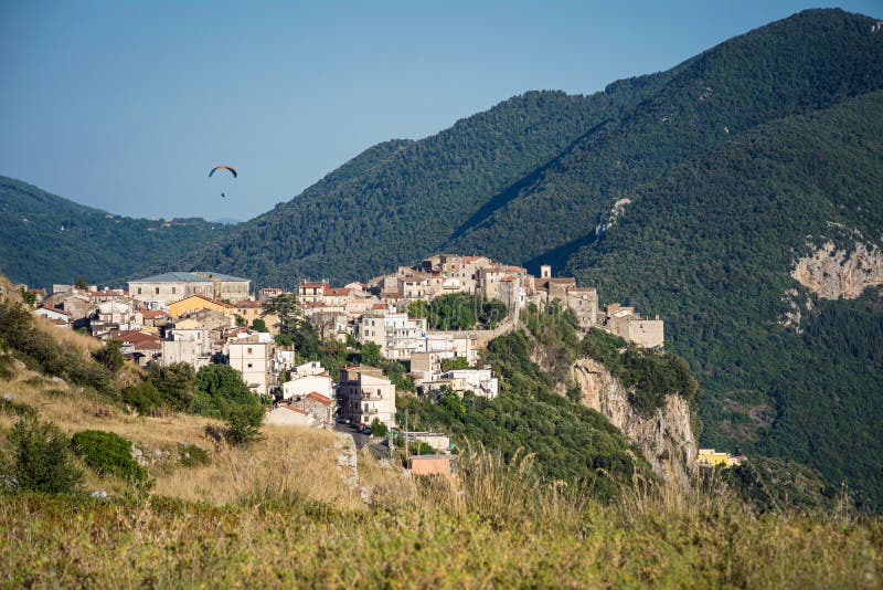 Beautiful Norma village with ancient romanesque ruins and medieval houses on the top of the hill. Traditional Italian landscape