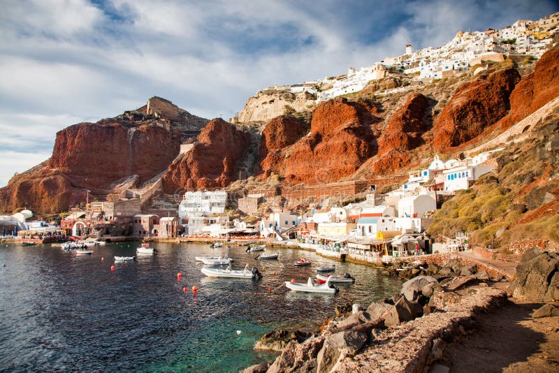 beautiful Oia town and caldera from old port Amoudi, Santorini island in Aegean sea, Greece