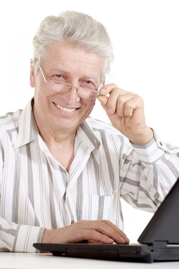 Beautiful old Caucasian man with laptop sits