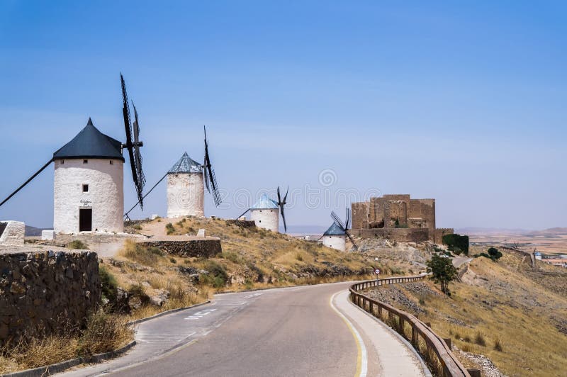 Beautiful and old windmills painted in white