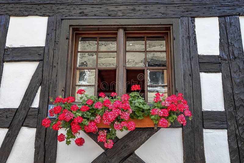 Beautiful old window frame with flower box.