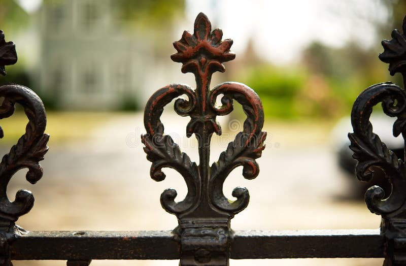 A closeup of the top of a wrought iron fence in Georgetown, SC. royalty free stock images A closeup of the top of a wrought iron fence in Georgetown, SC. royalty free stock images