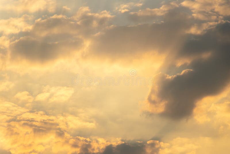 Beautiful Orange Light Sky with Cloud Background from Sunset Stock