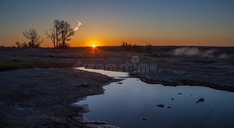 Beautiful orange sunrise at the Arabia mountain, Georgia