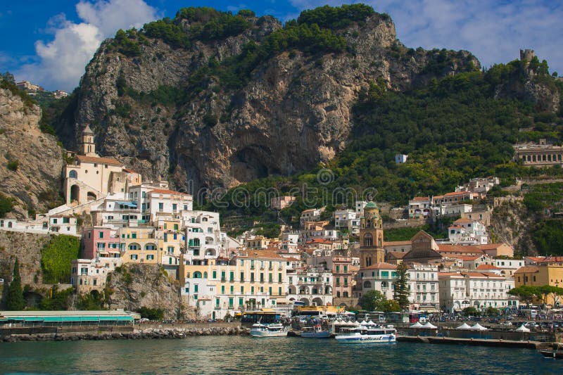 Beautiful panorama of Amalfi, the main town of the coast on which it is located taken from the tyrrhenian sea. Near Positano. Panoramic view with turquoise sea