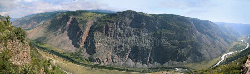 Beautiful panorama of mountains and twisting river, rest in remote area of Altai