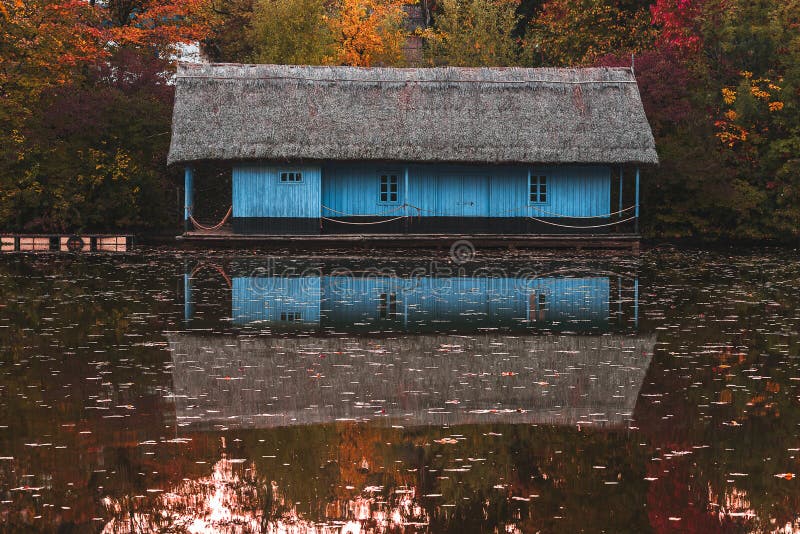 Beautiful picture with wooden house on the lake in autumn season, Herastrau Park from Bucharest. Beautiful picture with wooden house on the lake in autumn season, Herastrau Park from Bucharest