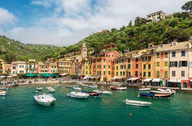 Beautiful Portofino in Italy with colorful houses and villas, fishing boats and luxury yachts in the little bay harbor stock photo Beautiful Portofino in Italy with colorful houses and villas, fishing boats and luxury yachts in the little bay harbor stock photo