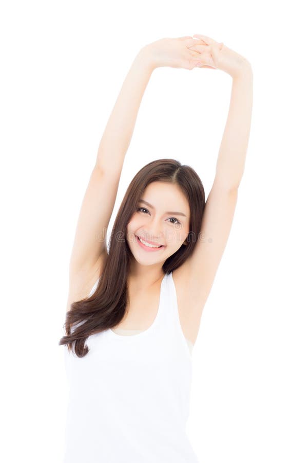 Beautiful portrait asian young woman smiling stretch hand with exercise and yoga isolated stock images Beautiful portrait asian young woman smiling stretch hand with exercise and yoga isolated stock images