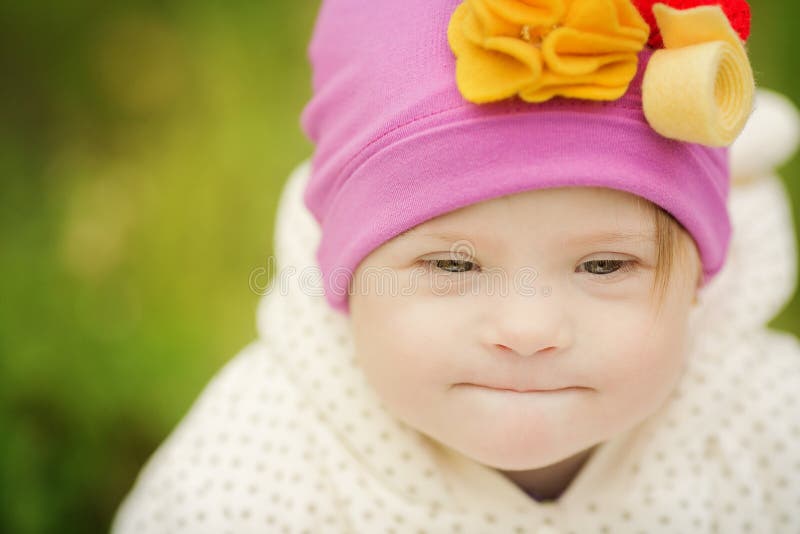 Beautiful portrait of a girl with Down syndrome
