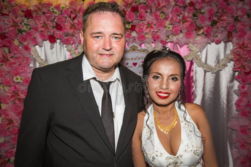 https://thumbs.dreamstime.com/b/beautiful-portrait-multi-cultural-wedding-couple-thai-bride-caucasian-groom-151627007.jpg