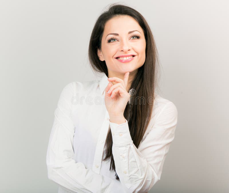 Beautiful Positive Business Happy Woman In White Shirt Showing Idea Sign By Finger And Looking