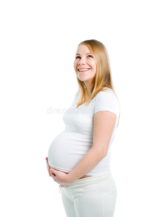 Beautiful pregnant blonde woman in studio sho