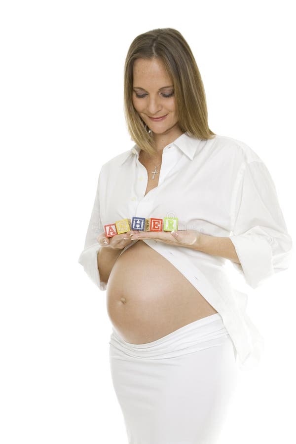 Beautiful Pregnant Woman Holding Baby Blocks