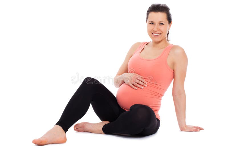 Beautiful pregnant woman sitting