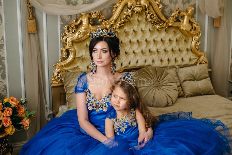 Beautiful Princess Mother and Daughter in a Gold Crown Stock Image ...