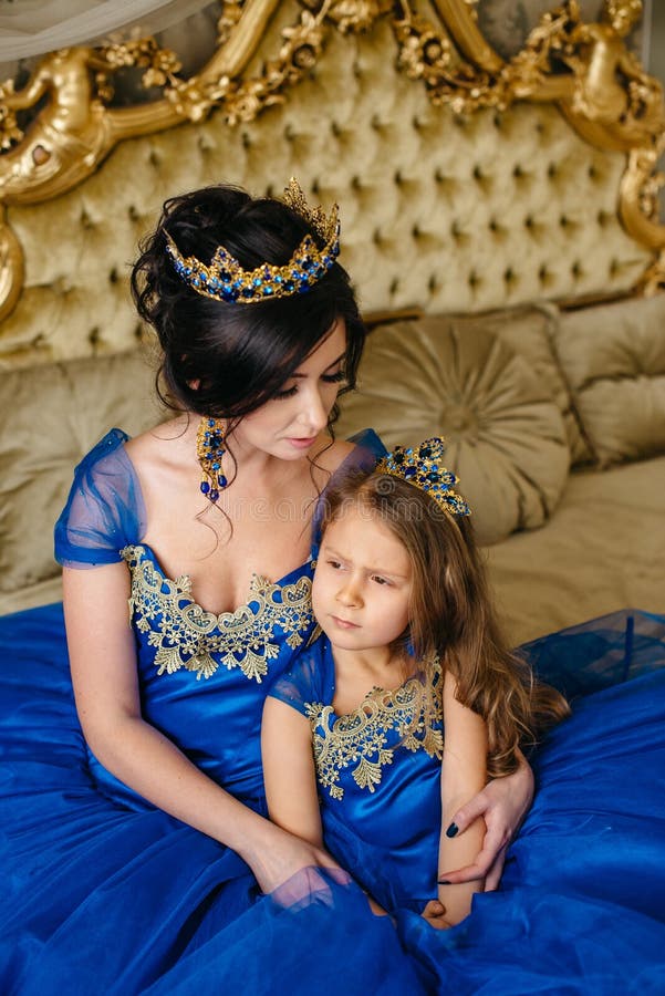 Beautiful Princess Mother and Daughter in a Gold Crown Stock Image ...