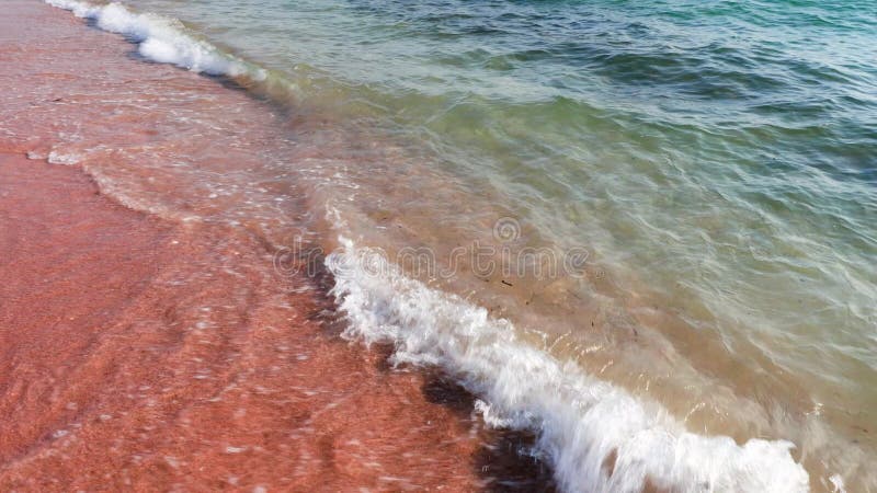 Beautiful red sand beach and turquoise water sea. Greece.