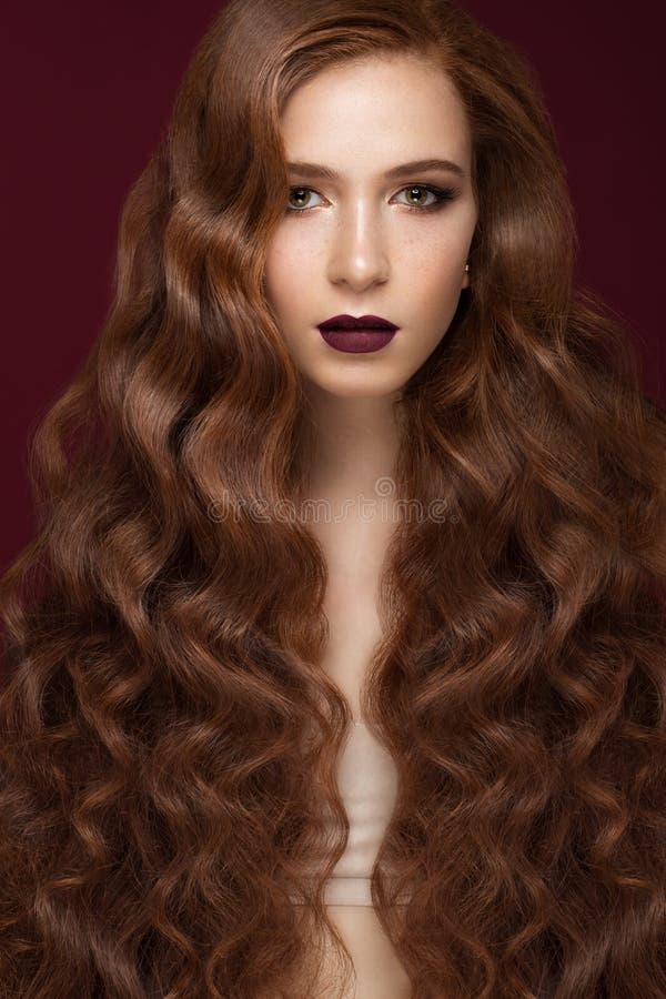 Beautiful Redhead Girl With A Perfectly Curls Hair And Classic Make Up 