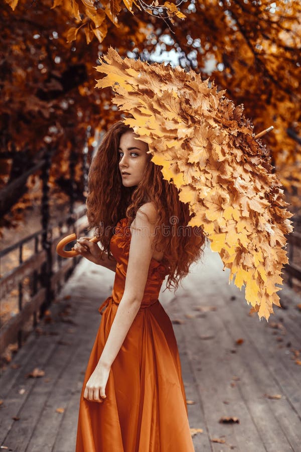 Beautiful redhead woman in autumn  portrait beauty portrait photoshoot