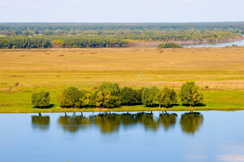 Beautiful river through the fields