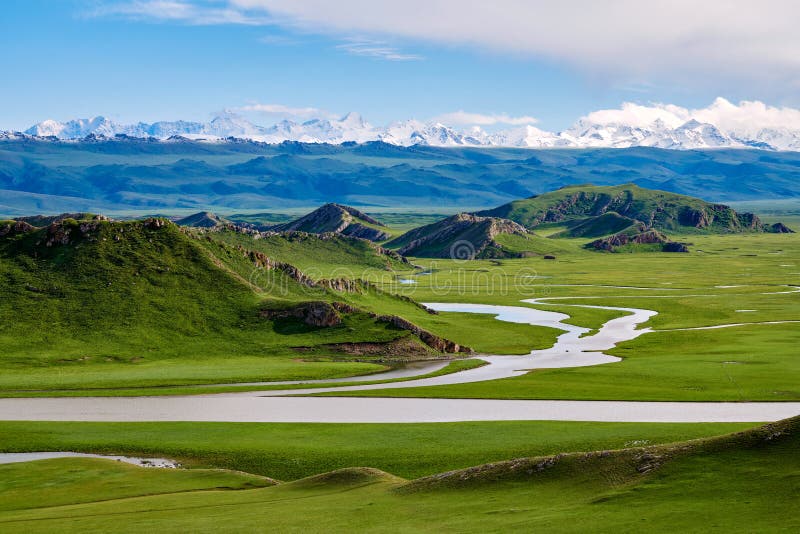 The beautiful river and snow mountains in Bayanbulak grassland