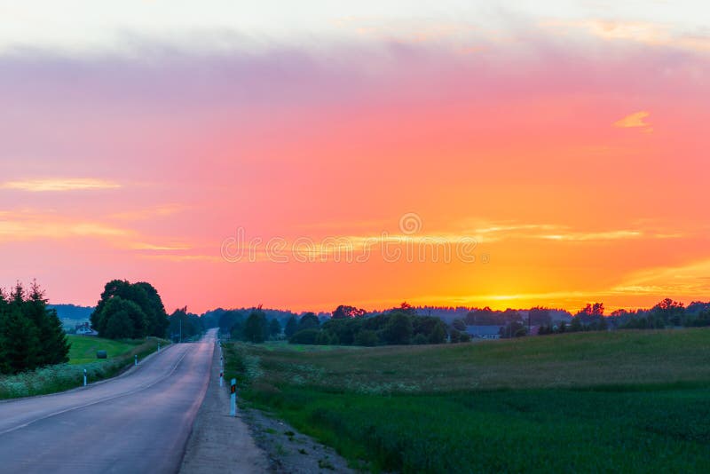 Beautiful Rural Asphalt Road Scenery At Sunsetasphalt Road Between