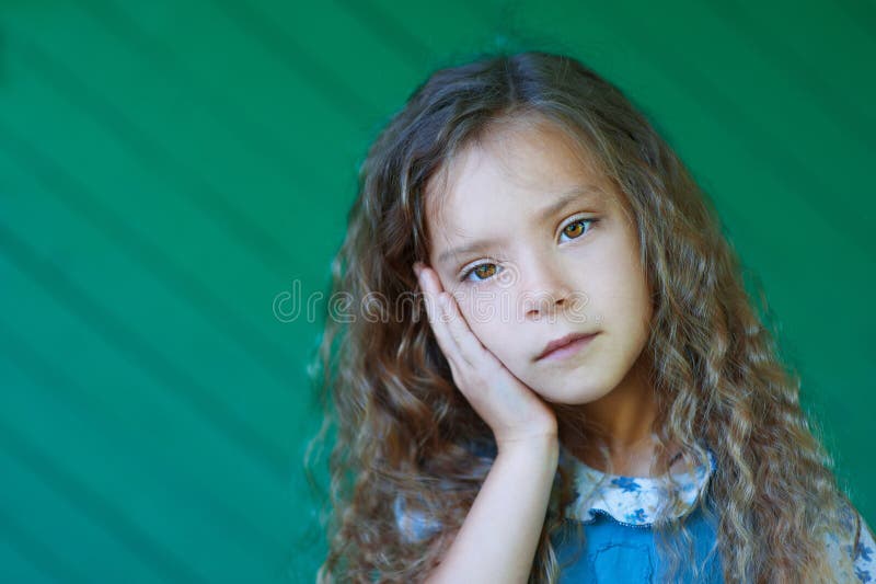 Beautiful sad little girl stock images