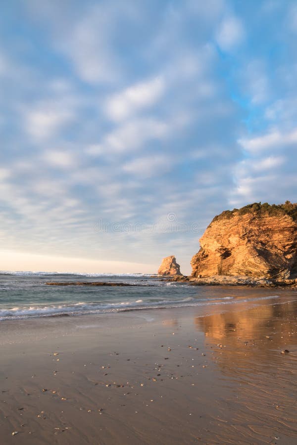 Beautiful sandy beach on atlantic coastline in sunset glow, hendaye, basque country, france. Beautiful sandy beach on atlantic coastline in sunset glow, hendaye royalty free stock image Beautiful sandy beach on atlantic coastline in sunset glow, hendaye, basque country, france. Beautiful sandy beach on atlantic coastline in sunset glow, hendaye royalty free stock image