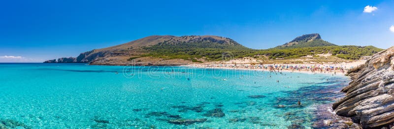 Beautiful sandy beach of Cala Mesquida, Mallorca, Balearic islands, Spain. Beautiful sandy beach of Cala Mesquida, Mallorca, Mediterranean Sea, Balearic islands royalty free stock image Beautiful sandy beach of Cala Mesquida, Mallorca, Balearic islands, Spain. Beautiful sandy beach of Cala Mesquida, Mallorca, Mediterranean Sea, Balearic islands royalty free stock image