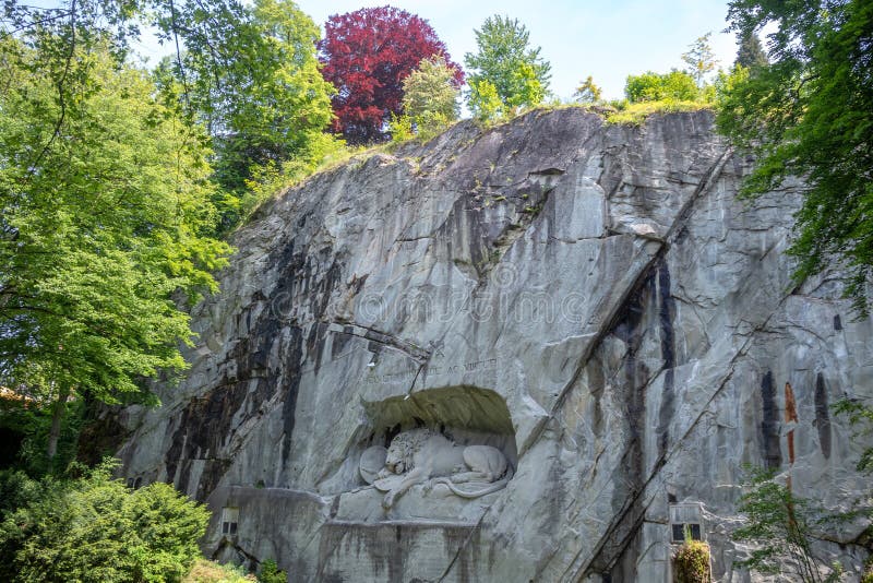 Beautiful scene of the lion monument, the famous tourist spot, with sunlight and fresh trees for background royalty free stock photography Beautiful scene of the lion monument, the famous tourist spot, with sunlight and fresh trees for background royalty free stock photography