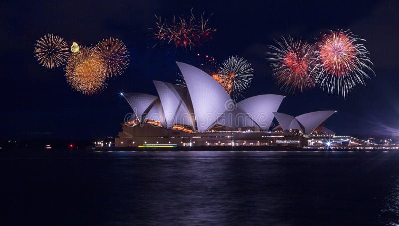 Beautiful scenery of fireworks over the Opera House of Sydney, Australia. A beautiful scenery of fireworks over the Opera House of Sydney, Australia