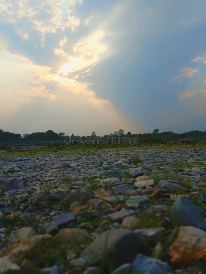 The beautiful scenery with white,black stone and grass. royalty free stock images