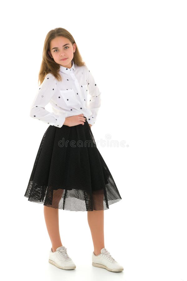 Beautiful school girl with long silky hair. royalty free stock photography