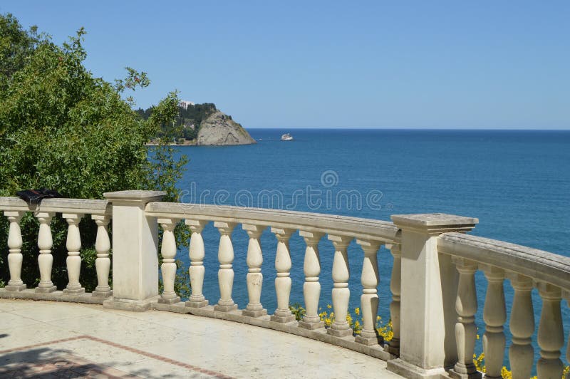 Beautiful seascape, view from white stone balustrade on Sunny summer day