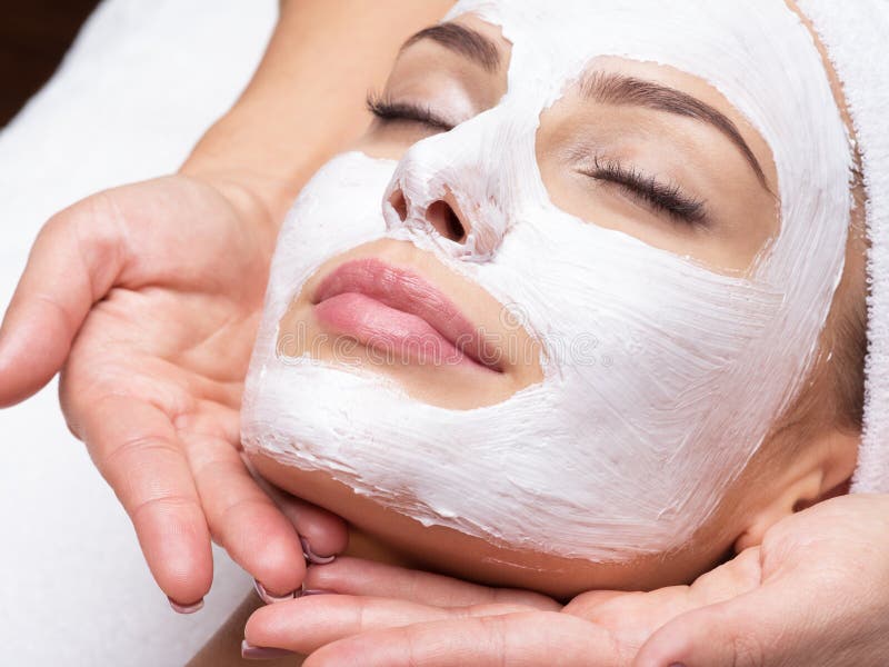 Spa Massage for Woman with Facial Mask on Face Stock Photo - Image of care,  face: 178272004