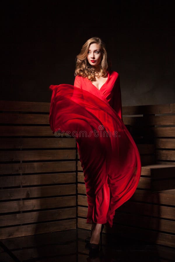 Beautiful Sensual Woman in Long Fashion Red Dress