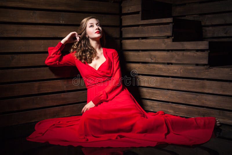 Beautiful Sensual Woman in Long Fashion Red Dress