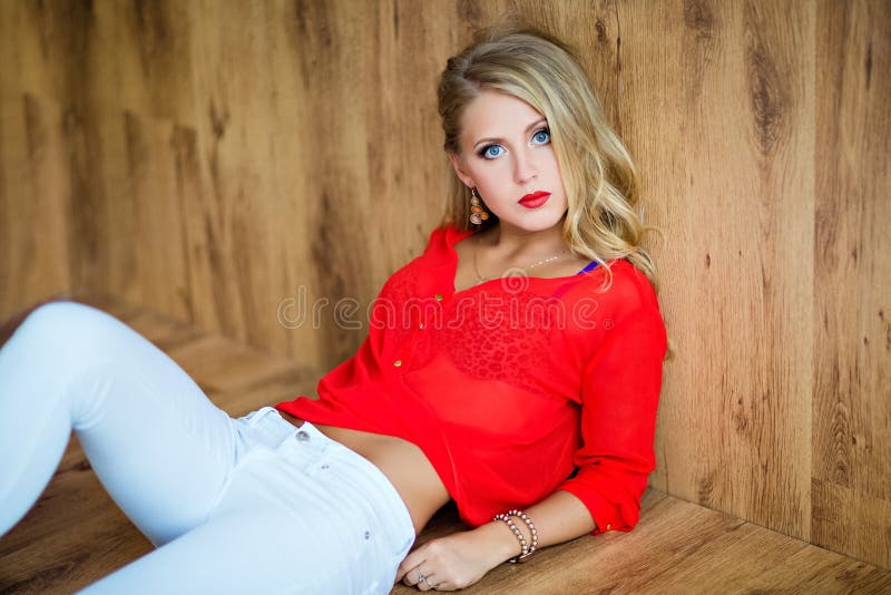 Very Beautiful Blonde Girl In A Red Blouse And White Pants Stock Image Image Of Glamour Eyes