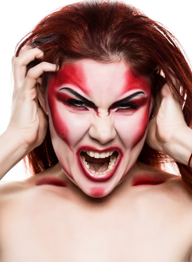 Beautiful devil girl with professional make-up. Fashion Art design. Attractive model girl in Halloween make up stock photography Beautiful devil girl with professional make-up. Fashion Art design. Attractive model girl in Halloween make up stock photography