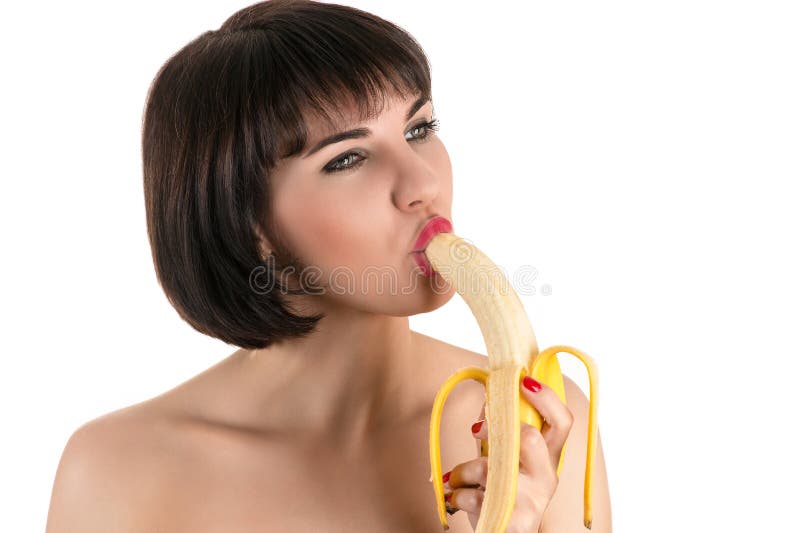 Beautiful woman eating banana. 