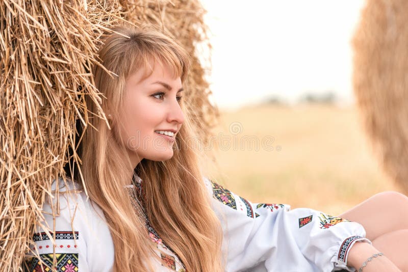 https://thumbs.dreamstime.com/b/beautiful-sexy-woman-embroidered-shirt-field-wheat-bales-lifestyle-ideal-advertising-beautiful-ukrainian-young-197903727.jpg