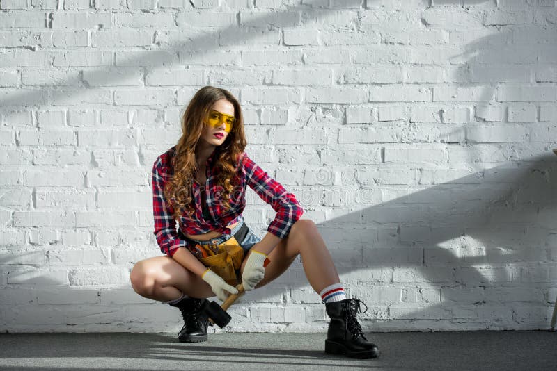 Beautiful Woman in Goggles with Tool Belt and Hammer Stock Image ...