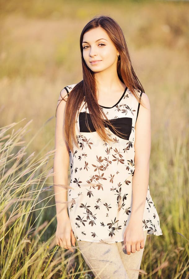 Beautiful woman on the nature stock photo