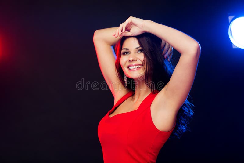 Beautiful Woman in Red Dancing at Nightclub Stock Photo - Image of ...