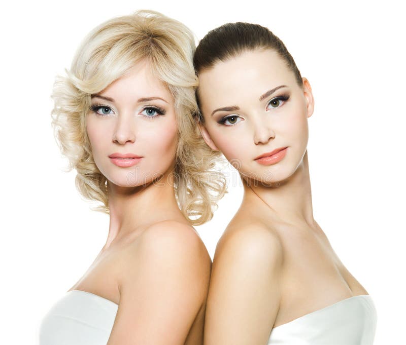 Beautiful young adult women posing on white stock photos Beautiful young adult women posing on white stock photos