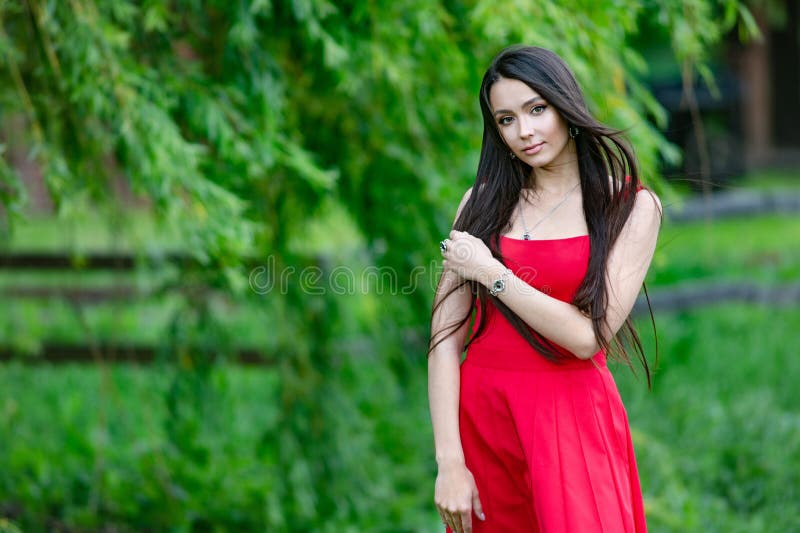 Beautiful Young Brunette Woman with Long Wavy Hair Thin Slender Figure ...